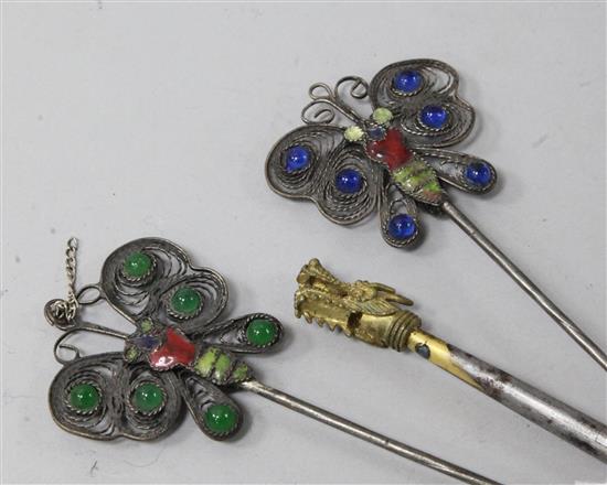 Three metal, glass and enamel hair ornaments